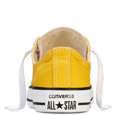 Желтые низкие Конверсы вид сзади