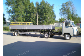 УАЗ .СЕДЕЛЬНЫЙ ТЯГАЧ С ПОЛУПРИЦЕПОМ . БОРТОВОЙ