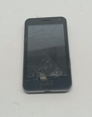 Неисправный телефон Chang jiang P5 (нет АКБ, разбит экран, не включается, нет задней крышки)