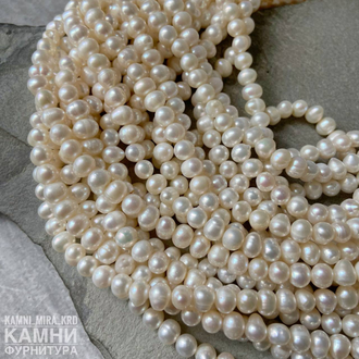 Жемчуг речной белый качество ААА 7,6-9,5 мм, цена за нить 18 см