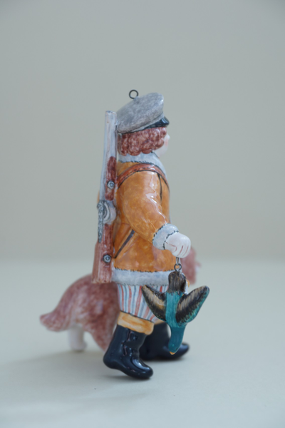 Охотник с собакой