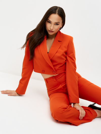 Брюки клеш от колена. Оранжевый