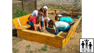 Песочница с крышкой-скамейкой