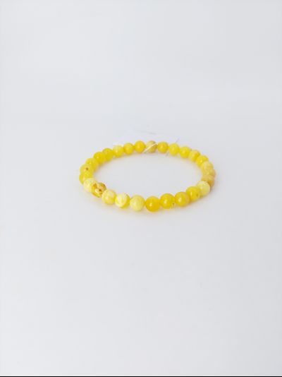 Браслет шары из белого янтаря