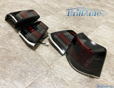 Cтопы Toyota Land Cruiser 200 07-15 LED темные БЕГАЮЩИЕ