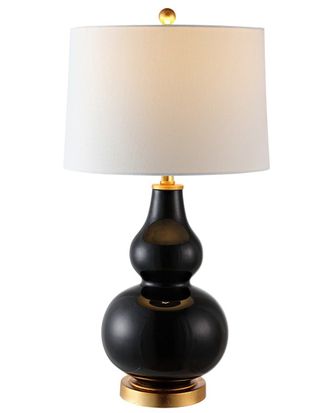 Настольная лампа черная с белым абажуром.