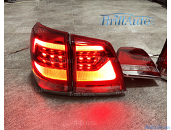 Cтопы Toyota Land Cruiser 200 07-15 в стиле 21 года LED (красные с белым низом)