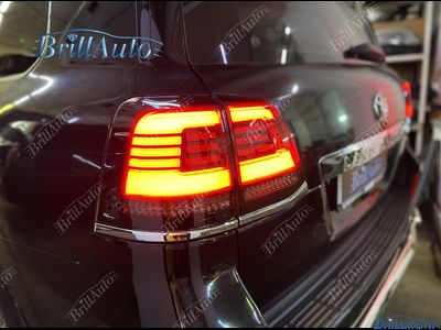 Cтопы Toyota Land Cruiser 200 07-15 LED темные БЕГАЮЩИЕ