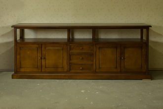 Большая тумба под ТВ и технику на цоколе.