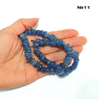 Кианит натуральный (бусины) №11: галтовка-таблетка микс (нитка 42см)