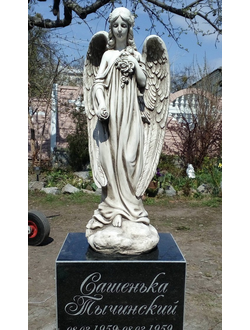 Памятник со статуей Ангела с цветами