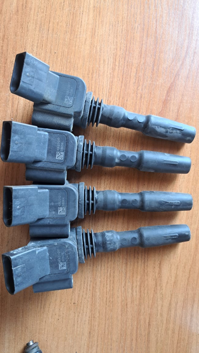 Катушка зажигания SKODA RAPID (04Е90511ОК)