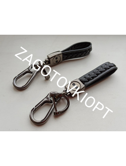 Брелок на кожаном плетеном ремешке с линзой