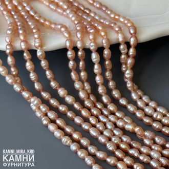 Жемчуг речной персиковый мелкий рис фри-форм 4-4,7х3-3,5 мм с щербинками, цена за нить 17 см