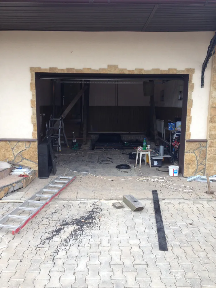 Монтаж погреба в гараже