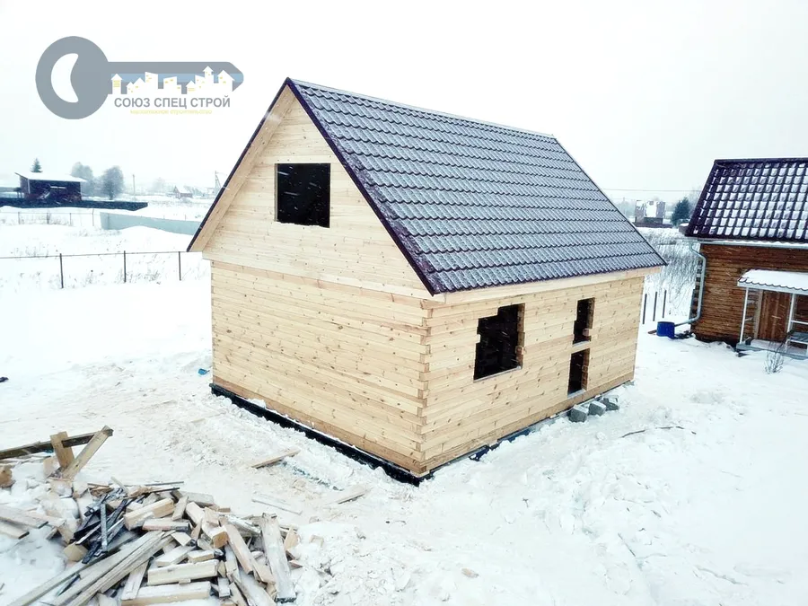Сруб дома с мансардным этажом