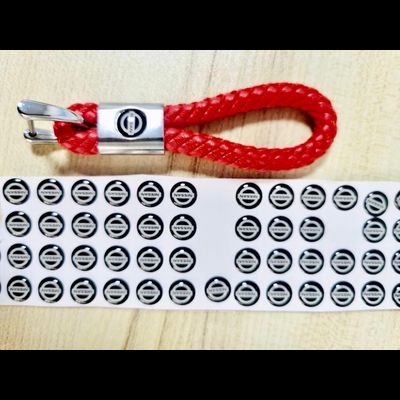 БРЕЛОК С КОЖАНЫМ ПЛЕТЁНЫМ РЕМЕШКОМ ПОД ВСТАВКУ ЛОГОТИПА С ЛИНЗОЙ