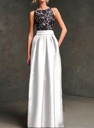 Черно белое вечернее атласное платье в пол на свадьбу имеет V-образно открытую спину и пышную юбку