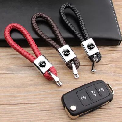 БРЕЛОК С КОЖАНЫМ ПЛЕТЁНЫМ РЕМЕШКОМ С ЛОГОТИПОМ АВТО ЧЁРНЫЙ