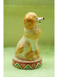 Пудель на тумбе