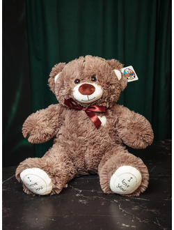 Плюшевый медведь с бантиком