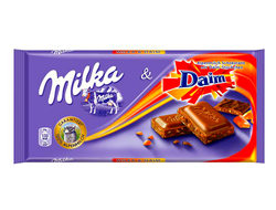 Шоколад Milka с конфетками Daim