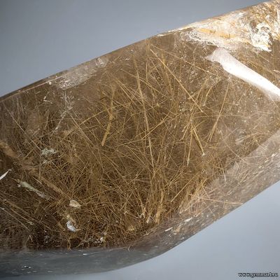 Рутил  в дымчатом кварце, галтель. Россия. 145*75*65мм