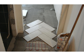 Монтаж теплого пола под плитку фото