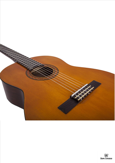 Фото крепления струн на гитаре YAMAHA C40