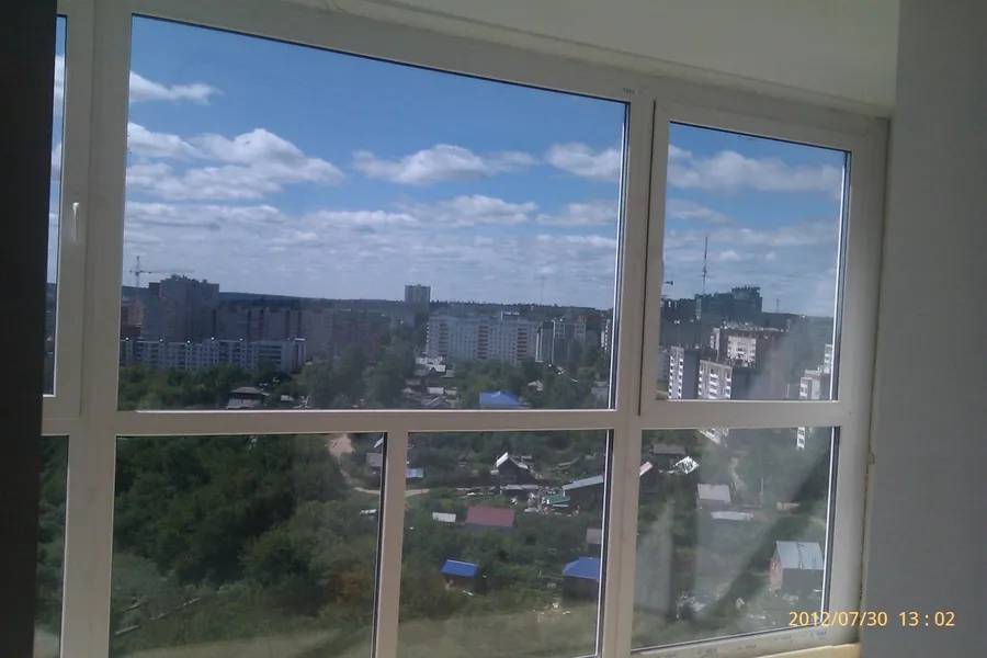 Установка панорамного остекления на 12 этаже, использованы усиленные профиля, Термоокна Родниковая 70 