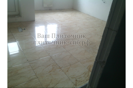 Укладка керамогранита на пол.