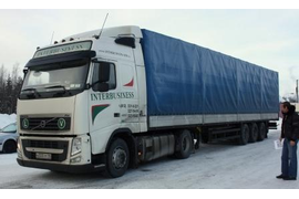 Автомобильные перевозки грузов массой до 27 тонн в тентованных