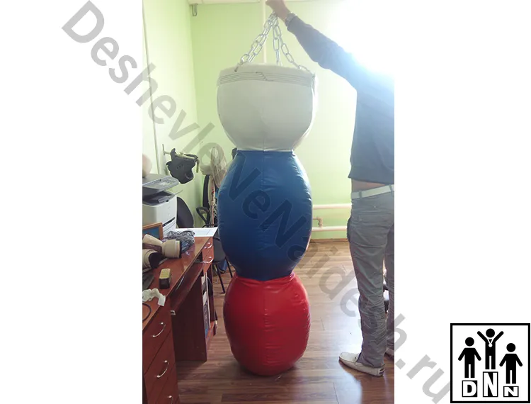 Тpёxceкциoнный боксерский мешок