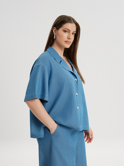 Рубашка голубая свободного кроя