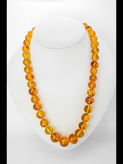 Бусы "Мятый шар" из медового янтаря 08966