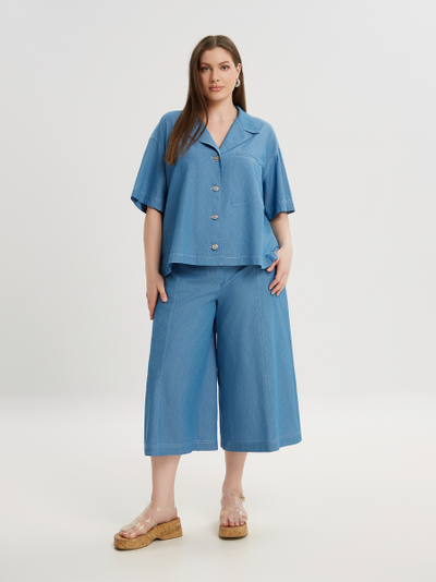 Рубашка голубая свободного кроя